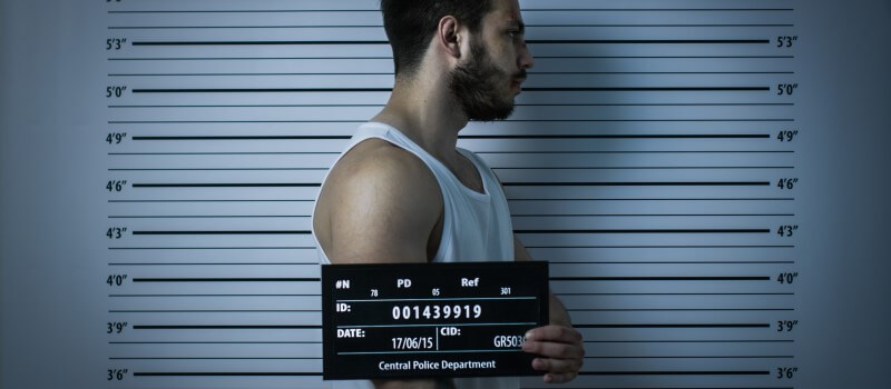 Person turning to the side for a mugshot