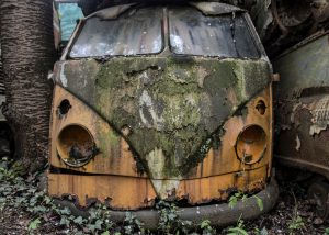 broken down bus with overgrowth