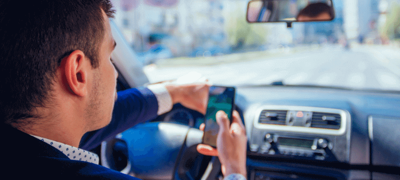 Person texting while driving