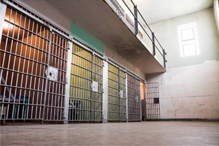 3 jail cells holding people accused of reckless discharge of a firearm