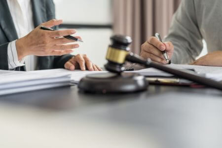 Lawyer meeting with client.